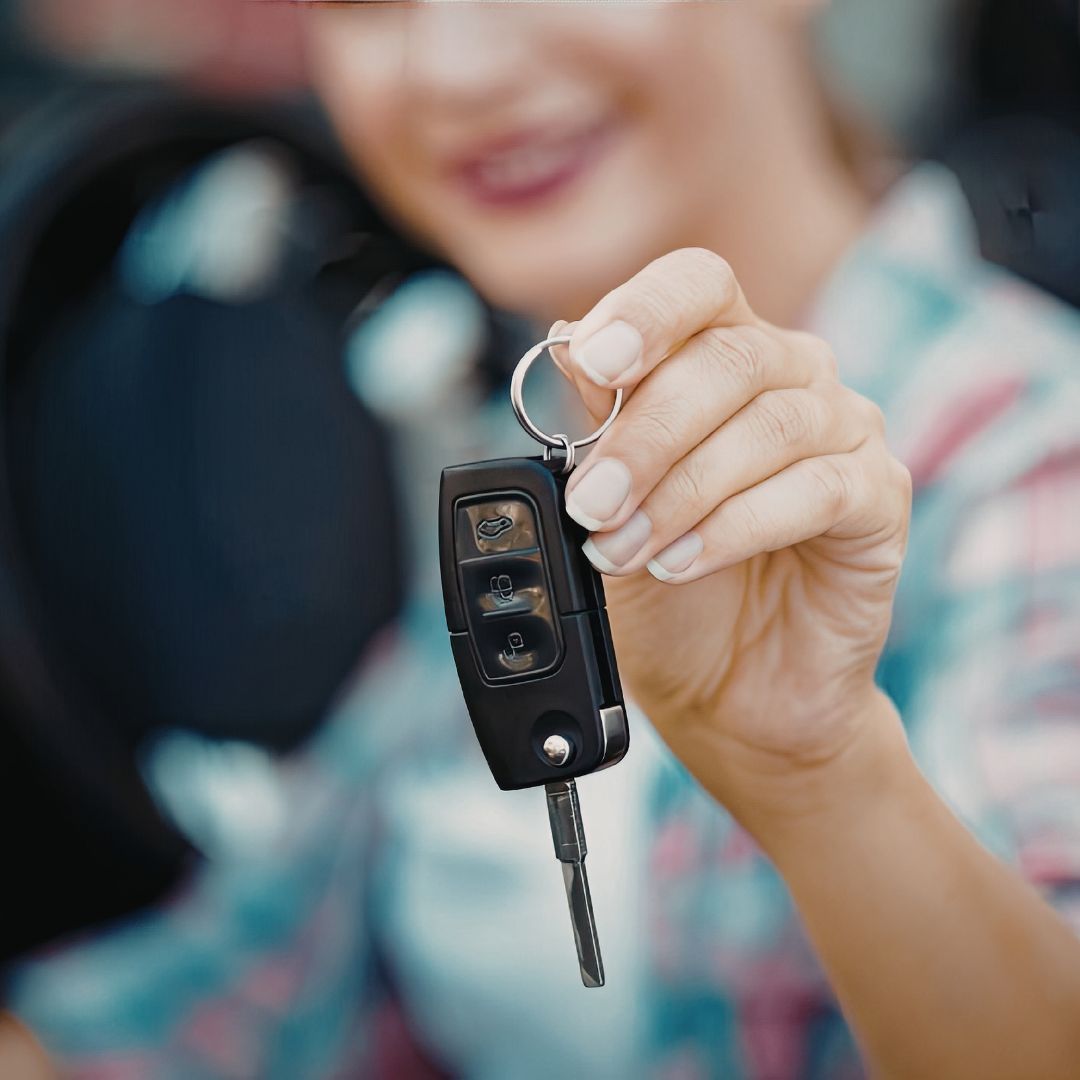 Spare Car Key Cost in Worthing spare car key cost, driver holding a spare flip key