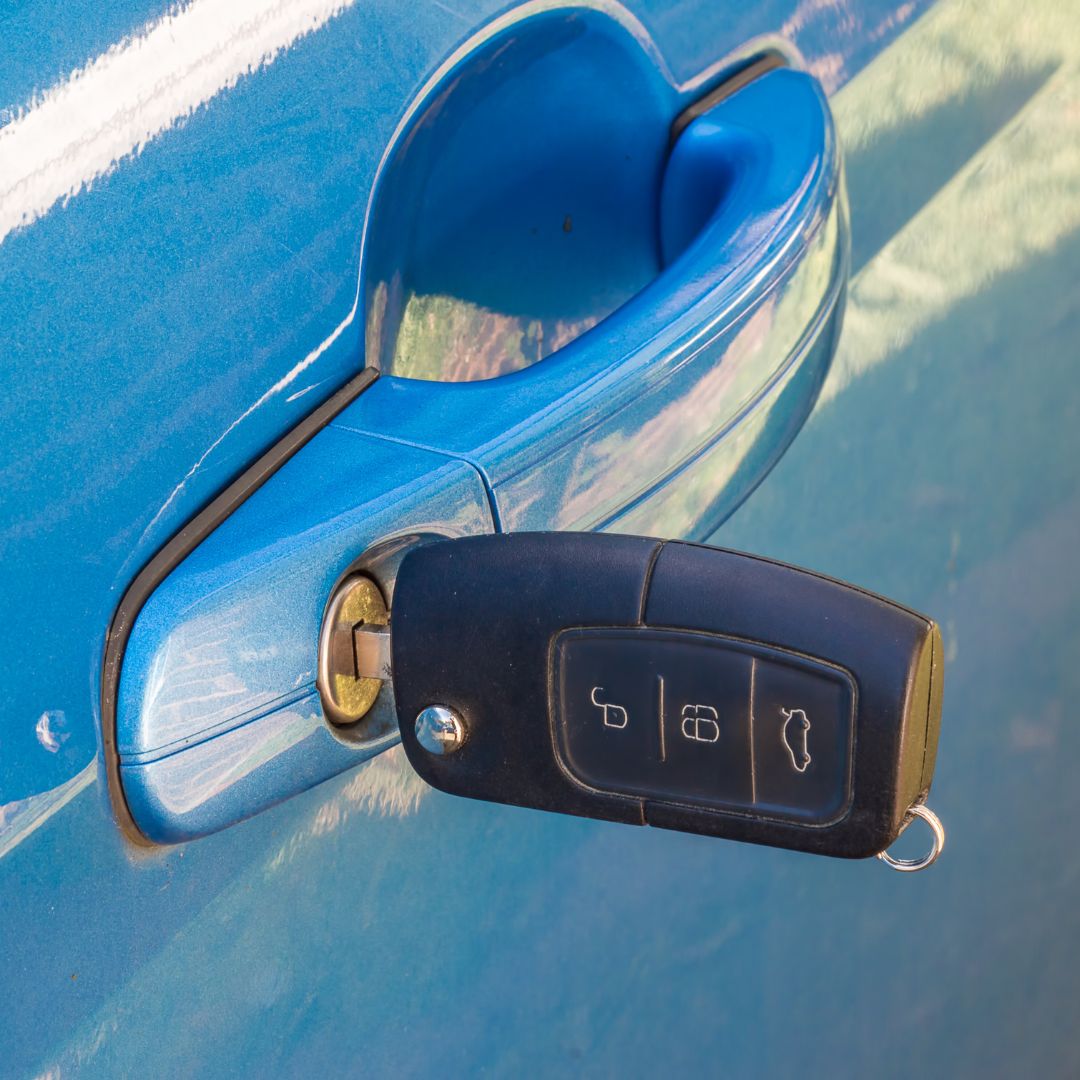 keyless car theft relay attack, remote key resting on a car